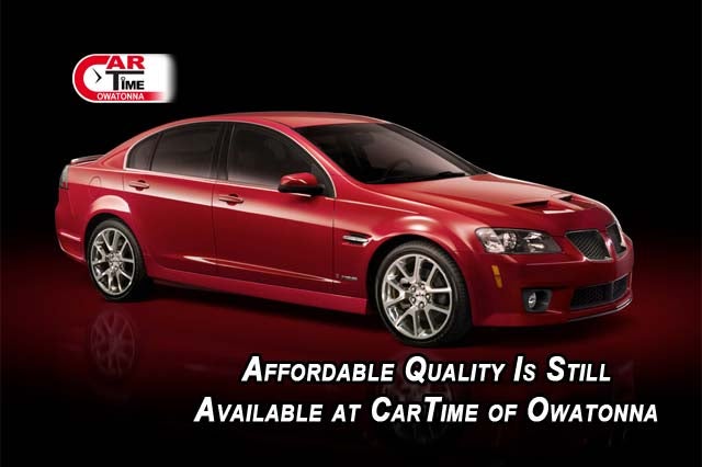 Red sedan at Car Time of Owatonna in Owatonna MN